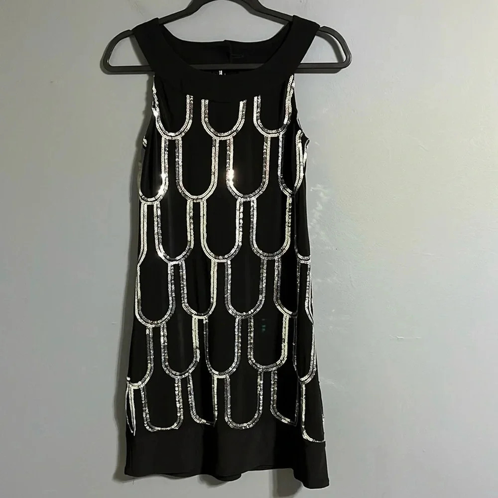 B.Darlin size 3/4 sleeveless black dress with silver sequins.